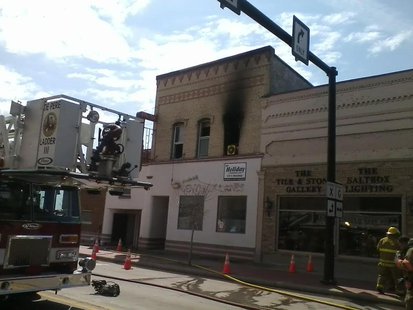 Fire damages an apartment above Century Lanes on South Broadway in De Pere on May 5, 2014. (Copyright Midwest Communications, Inc.) Fire damages an apartment above Century Lanes on South Broadway in De Pere on May 5, 2014. (Copyright Midwest Communications, Inc.)
