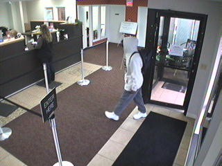 Surveillance cameras captured the suspect on video. Surveillance cameras captured the suspect on video.