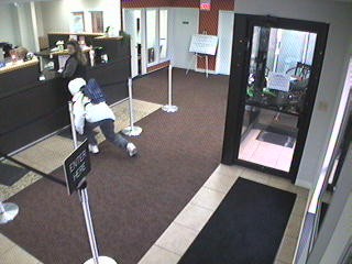 Surveillance cameras captured the suspect on video. Surveillance cameras captured the suspect on video.