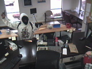 Surveillance cameras captured the suspect on video. Surveillance cameras captured the suspect on video.