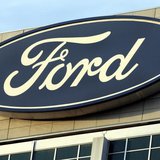 The Ford Motor Co's logo is seen on top of the Ford Motor Company World Headquarters in Dearborn, Michigan, October 26, 2009. REUTERS/Rebecc The Ford Motor Co's logo is seen on top of the Ford Motor Company World Headquarters in Dearborn, Michigan, October 26, 2009. REUTERS/Rebecc