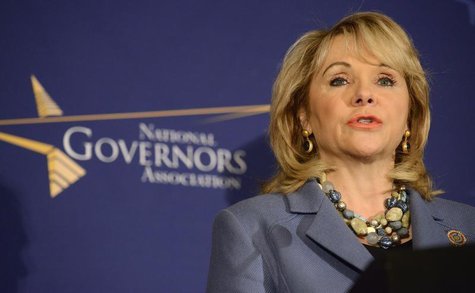 Oklahoma Republican Governor Mary Fallin, chair of the National Governors Association, makes opening remarks at a news conference prior to t Oklahoma Republican Governor Mary Fallin, chair of the National Governors Association, makes opening remarks at a news conference prior to t