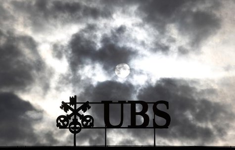 Dark clouds are seen over Swiss bank UBS logo on the company's buiding at Paradeplatz in Zurich, March 3, 2012. REUTERS/Christian Hartmann Dark clouds are seen over Swiss bank UBS logo on the company's buiding at Paradeplatz in Zurich, March 3, 2012. REUTERS/Christian Hartmann