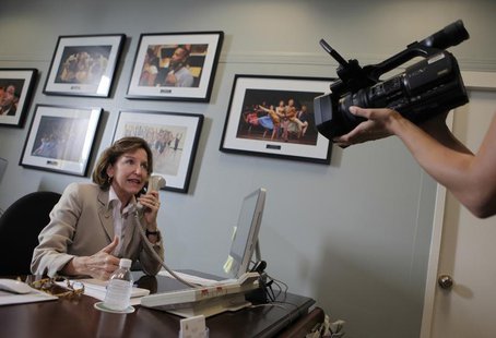 Sen. Kay Hagan (D-NC) answers phone calls from constituents in her office on Capitol Hill in Washington July 29, 2011. REUTERS/Yuri Gripas Sen. Kay Hagan (D-NC) answers phone calls from constituents in her office on Capitol Hill in Washington July 29, 2011. REUTERS/Yuri Gripas