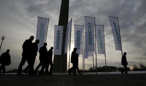 Shareholders of German engineering group Siemens arrive for the company's annual shareholder meeting in Munich January 28, 2014. REUTERS/Mic Shareholders of German engineering group Siemens arrive for the company's annual shareholder meeting in Munich January 28, 2014. REUTERS/Mic