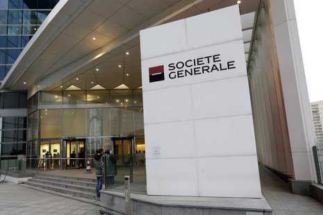 Members of a French scientific police inspect the scene after a man opened fire outside the French bank Societe Generale building in the fin Members of a French scientific police inspect the scene after a man opened fire outside the French bank Societe Generale building in the fin