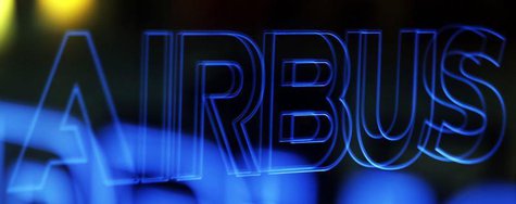The name of Airbus Group is reflected in a window during the Airbus Group 2013 annual results presentation in Toulouse February 26, 2014. RE The name of Airbus Group is reflected in a window during the Airbus Group 2013 annual results presentation in Toulouse February 26, 2014. RE