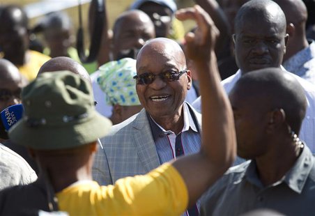 South African President Jacob Zuma greets supporters of African National Congress after voting at a voting station in the Nkandla district M South African President Jacob Zuma greets supporters of African National Congress after voting at a voting station in the Nkandla district M