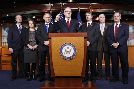 U.S. House Armed Services Committee Chairman Rep. Buck McKeon (R-CA) (C), flanked by Republican members of his committee, holds a news confe U.S. House Armed Services Committee Chairman Rep. Buck McKeon (R-CA) (C), flanked by Republican members of his committee, holds a news confe