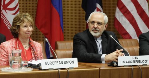 European Union foreign policy chief Catherine Ashton (L) and Iranian Foreign Minister Mohammad Javad Zarif wait for the start of talks in Vi European Union foreign policy chief Catherine Ashton (L) and Iranian Foreign Minister Mohammad Javad Zarif wait for the start of talks in Vi