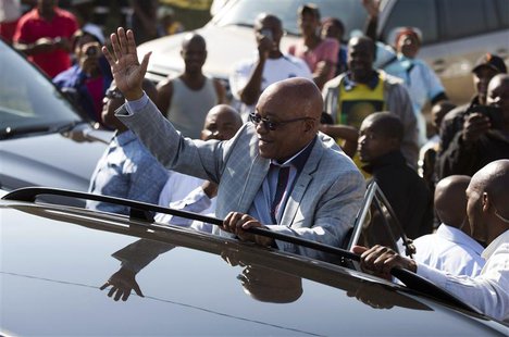 South African President Jacob Zuma greets supporters of African National Congress after voting at a voting station in the Nkandla district M South African President Jacob Zuma greets supporters of African National Congress after voting at a voting station in the Nkandla district M
