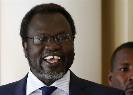 South Sudan's rebel leader Riek Machar smiles as he meets his friends at Sheraton Hotel in Addis Ababa May 9, 2014. REUTERS/Goran Tomasevic South Sudan's rebel leader Riek Machar smiles as he meets his friends at Sheraton Hotel in Addis Ababa May 9, 2014. REUTERS/Goran Tomasevic