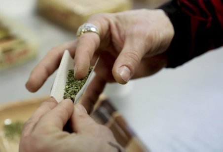 A participant practices rolling a joint at the Cannabis Carnivalus 4/20 event in Seattle, Washington April 20, 2014. REUTERS/Jason Redmond A participant practices rolling a joint at the Cannabis Carnivalus 4/20 event in Seattle, Washington April 20, 2014. REUTERS/Jason Redmond