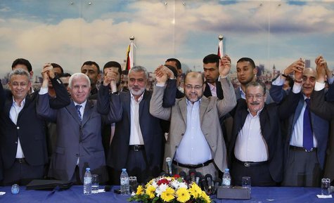 Senior Fatah official Azzam Al-Ahmed (2nd L), head of the Hamas government Ismail Haniyeh (3rd L) and senior Hamas leader Moussa Abu Marzouq Senior Fatah official Azzam Al-Ahmed (2nd L), head of the Hamas government Ismail Haniyeh (3rd L) and senior Hamas leader Moussa Abu Marzouq
