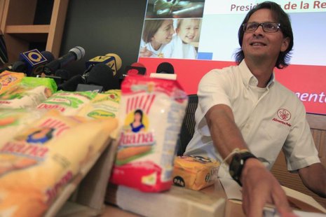 Lorenzo Mendoza, owner of Venezuela's largest private food production company Empresas Polar, attends a news conference in Caracas May 13, 2 Lorenzo Mendoza, owner of Venezuela's largest private food production company Empresas Polar, attends a news conference in Caracas May 13, 2