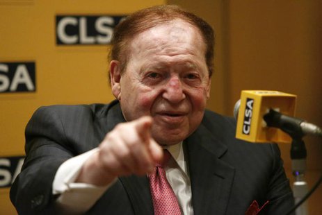 Las Vegas Sands Corp Chairman and Chief Executive Officer Sheldon Adelson points a reporter during a news conference in Tokyo February 24, 2 Las Vegas Sands Corp Chairman and Chief Executive Officer Sheldon Adelson points a reporter during a news conference in Tokyo February 24, 2
