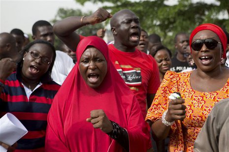 People demand for the release of 200 secondary school girls abducted in the remote village of Chibok, during a protest at Unity Park in Abuj People demand for the release of 200 secondary school girls abducted in the remote village of Chibok, during a protest at Unity Park in Abuj