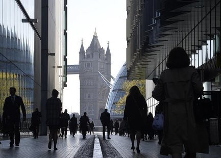 City workers head to work during the morning rush hour in Southwark in central London April 16, 2014. REUTERS/Toby Melville City workers head to work during the morning rush hour in Southwark in central London April 16, 2014. REUTERS/Toby Melville