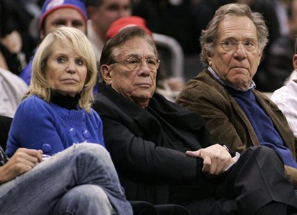 Los Angeles Clippers owner Donald Sterling (C), his wife Shelly (L) and actor George Segal attend the NBA basketball game between the Toront Los Angeles Clippers owner Donald Sterling (C), his wife Shelly (L) and actor George Segal attend the NBA basketball game between the Toront