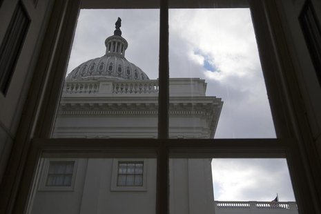 A general view of the U.S. Capitol dome as seen from a window outside the Senate chamber in Washington December 18, 2013. REUTERS/Jonathan E A general view of the U.S. Capitol dome as seen from a window outside the Senate chamber in Washington December 18, 2013. REUTERS/Jonathan E