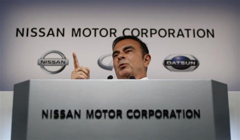 Nissan Motor Co's President and Chief Executive Officer Carlos Ghosn gestures as he speaks at a news conference at its headquarters in Yokoh Nissan Motor Co's President and Chief Executive Officer Carlos Ghosn gestures as he speaks at a news conference at its headquarters in Yokoh