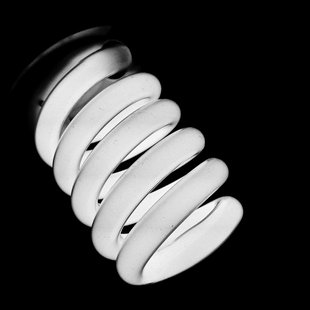 A CFL light bulb. A CFL light bulb.