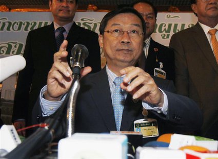 Newly elected Senate Speaker Surachai Liengboonlertchai gestures during a news conference at Parliament in Bangkok May 13, 2014. REUTERS/Cha Newly elected Senate Speaker Surachai Liengboonlertchai gestures during a news conference at Parliament in Bangkok May 13, 2014. REUTERS/Cha