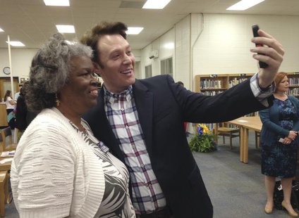 Democratic nominee Clay Aiken takes a pictures with a constituent after a campaign forum in Cary, North Carolina, April 28, 2014. REUTERS/Co Democratic nominee Clay Aiken takes a pictures with a constituent after a campaign forum in Cary, North Carolina, April 28, 2014. REUTERS/Co