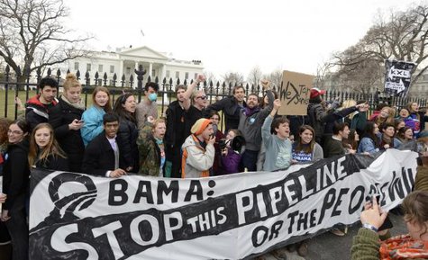 Environmentalists, many of whom have zip-tied themselves to the fence of the White House in Washington, rally and call on U.S. President Barack Obama to reject the Keystone XL pipeline in this March 2, 2014 file photo. Billionaire Tom Steyer's take-no-prisoners stance on Keystone has raised questions about whether he might undercut the party's chance to retain control of the Senate.
CREDIT: REUTERS/MIKE THEILER/FILES Environmentalists, many of whom have zip-tied themselves to the fence of the White House in Washington, rally and call on U.S. President Barack Obama to reject the Keystone XL pipeline in this March 2, 2014 file photo. Billionaire Tom Steyer's take-no-prisoners stance on Keystone has raised questions about whether he might undercut the party's chance to retain control of the Senate.
CREDIT: REUTERS/MIKE THEILER/FILES