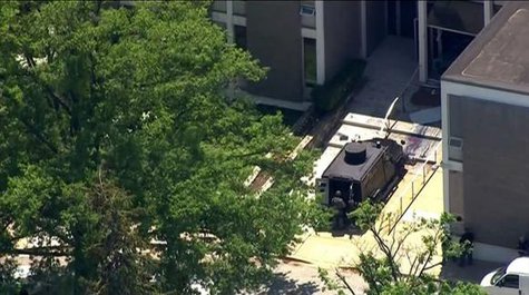 Police tactical team members arrive outside the ABC 2 news station after a possibly armed suspect crashed a vehicle into the Maryland television news station and barricaded himself inside the building, in Towson, Maryland, in this still image taken from video on May 13, 2014.
CREDIT: REUTERS/COURTESY-WBAL-TV/HANDOUT VIA REUTERS Police tactical team members arrive outside the ABC 2 news station after a possibly armed suspect crashed a vehicle into the Maryland television news station and barricaded himself inside the building, in Towson, Maryland, in this still image taken from video on May 13, 2014.
CREDIT: REUTERS/COURTESY-WBAL-TV/HANDOUT VIA REUTERS