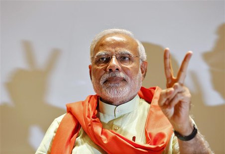 Hindu nationalist Narendra Modi, the prime ministerial candidate for India's main opposition Bharatiya Janata Party (BJP), gestures upon his Hindu nationalist Narendra Modi, the prime ministerial candidate for India's main opposition Bharatiya Janata Party (BJP), gestures upon his