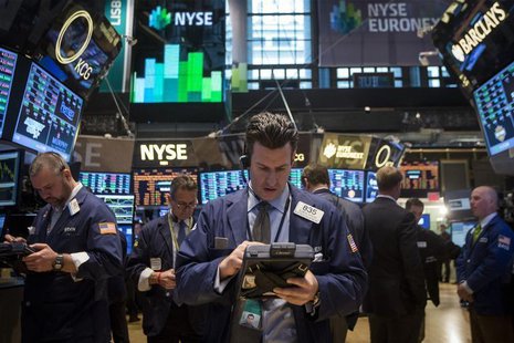Traders work on the floor of the New York Stock Exchange March 17, 2014. REUTERS/Brendan McDermid Traders work on the floor of the New York Stock Exchange March 17, 2014. REUTERS/Brendan McDermid