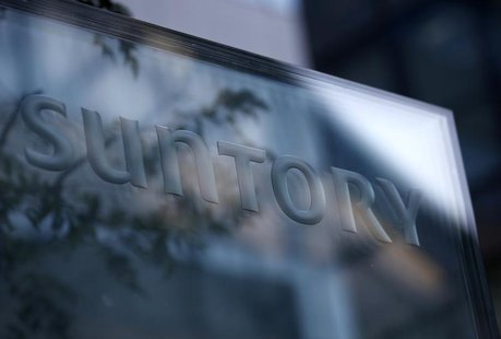 A signboard of Suntory Holdings is displayed at the entrance of Suntory World Headquarters in Tokyo January 14, 2014. REUTERS/Issei Kato A signboard of Suntory Holdings is displayed at the entrance of Suntory World Headquarters in Tokyo January 14, 2014. REUTERS/Issei Kato