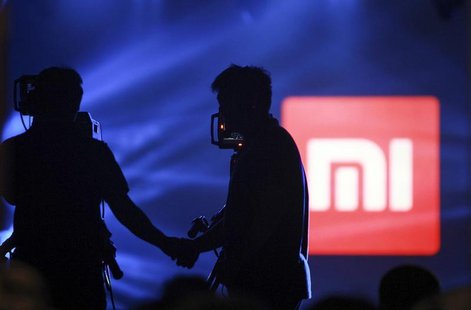 A logo of Xiaomi is seen at Xiaomi's tablet launch event in Beijing, May 15, 2014. REUTERS/China Daily A logo of Xiaomi is seen at Xiaomi's tablet launch event in Beijing, May 15, 2014. REUTERS/China Daily