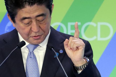 Japanese Prime Minister Shinzo Abe delivers a speech at the Ministerial Meeting of the Organisation for Economic Co-operation and Developmen Japanese Prime Minister Shinzo Abe delivers a speech at the Ministerial Meeting of the Organisation for Economic Co-operation and Developmen