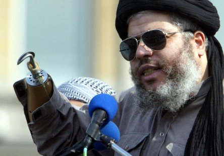 Radical Muslim cleric Sheikh Abu Hamza al-Masri addresses the sixth annual rally for Islam in Trafalgar Square, London, August 25, 2002. REU Radical Muslim cleric Sheikh Abu Hamza al-Masri addresses the sixth annual rally for Islam in Trafalgar Square, London, August 25, 2002. REU