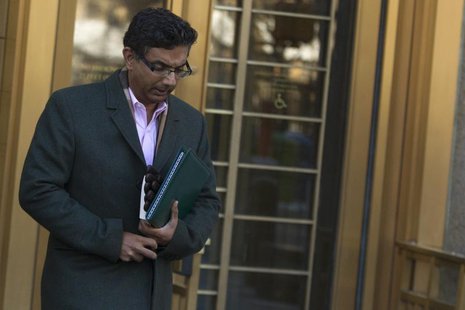 Conservative commentator and best-selling author, Dinesh D'Souza exits the Manhattan Federal Courthouse in New York, January 24, 2014. REUTE Conservative commentator and best-selling author, Dinesh D'Souza exits the Manhattan Federal Courthouse in New York, January 24, 2014. REUTE