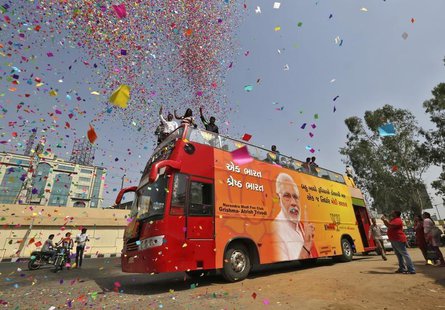 Supporters of Hindu nationalist Narendra Modi, the prime ministerial candidate for India's main opposition Bharatiya Janata Party (BJP), sho Supporters of Hindu nationalist Narendra Modi, the prime ministerial candidate for India's main opposition Bharatiya Janata Party (BJP), sho
