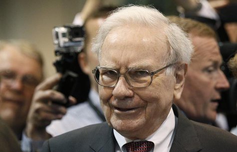 Berkshire Hathaway CEO Warren Buffett reacts at the trade show during the company's annual meeting in Omaha, Nebraska May 3, 2014. REUTERS/R Berkshire Hathaway CEO Warren Buffett reacts at the trade show during the company's annual meeting in Omaha, Nebraska May 3, 2014. REUTERS/R