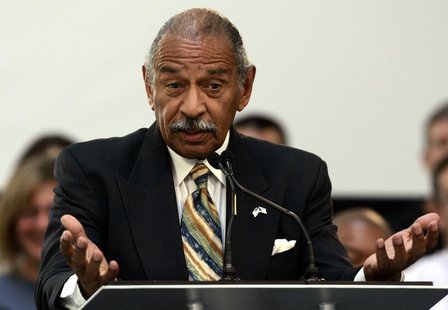 U.S. Representative John Conyers addresses the audience during a news conference at the Ford Motor Research & Innovation Center in Dearborn, U.S. Representative John Conyers addresses the audience during a news conference at the Ford Motor Research & Innovation Center in Dearborn,
