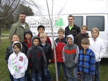 Pictured: Helping to plant the tree with Tyler Jackson, college student and former Wilson School student working his summer job at Don Caan's, are Karol Bonilla, Colten Jackson, Lillianna Gutoski, Jacob Greene, Brooke Brendel, Bryant Brost, Ekin Chang, Molly Stuefen, Neal Yang and Principal Chad Renzelmann. Pictured: Helping to plant the tree with Tyler Jackson, college student and former Wilson School student working his summer job at Don Caan's, are Karol Bonilla, Colten Jackson, Lillianna Gutoski, Jacob Greene, Brooke Brendel, Bryant Brost, Ekin Chang, Molly Stuefen, Neal Yang and Principal Chad Renzelmann.