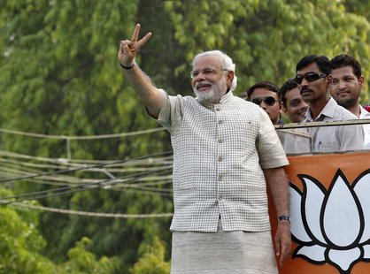 Hindu nationalist Narendra Modi, the prime ministerial candidate for India's main opposition Bharatiya Janata Party (BJP), gestures during a Hindu nationalist Narendra Modi, the prime ministerial candidate for India's main opposition Bharatiya Janata Party (BJP), gestures during a