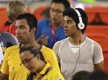 Colombia's track cyclist Edwin Alcibiades Avila Vanegas uses a pair of Beats by Dr. Dre headphones at the Velodrome during the London 2012 O Colombia's track cyclist Edwin Alcibiades Avila Vanegas uses a pair of Beats by Dr. Dre headphones at the Velodrome during the London 2012 O