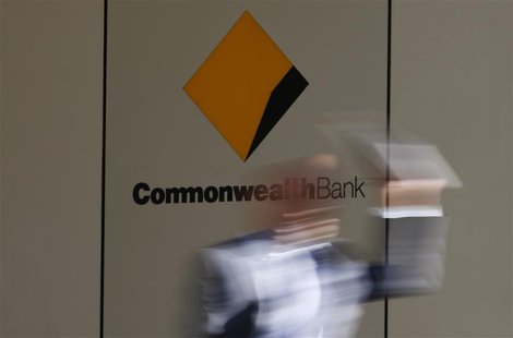 A man leaves the Commonwealth Bank of Australia building in central Sydney in this August 14, 2013 file photo. REUTERS/Daniel Munoz/Files A man leaves the Commonwealth Bank of Australia building in central Sydney in this August 14, 2013 file photo. REUTERS/Daniel Munoz/Files