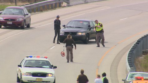 Authorities on scene after a survey crew worker was hit on the Hwy. 172 eastbound ramp on Monday, May 19, 2014. (Photo from: FOX 11.) Authorities on scene after a survey crew worker was hit on the Hwy. 172 eastbound ramp on Monday, May 19, 2014. (Photo from: FOX 11.)