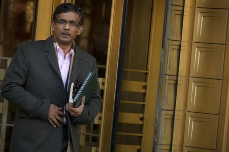 Conservative commentator and best-selling author, Dinesh D'Souza exits the Manhattan Federal Courthouse in New York, January 24, 2014. REUTE Conservative commentator and best-selling author, Dinesh D'Souza exits the Manhattan Federal Courthouse in New York, January 24, 2014. REUTE