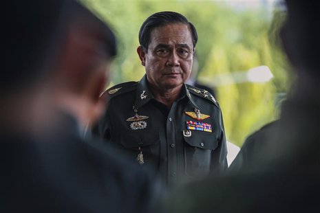 Thai Army chief General Prayuth Chan-ocha arrives before a meeting with high ranking officials at the Army Club, after the army declared mar Thai Army chief General Prayuth Chan-ocha arrives before a meeting with high ranking officials at the Army Club, after the army declared mar