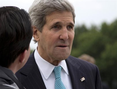 U.S. Secretary of State John Kerry pauses on the tarmac before boarding his plane at Andrews Air Force Base May 21, 2014, en route to Mexico U.S. Secretary of State John Kerry pauses on the tarmac before boarding his plane at Andrews Air Force Base May 21, 2014, en route to Mexico