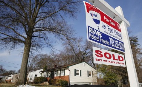 A home "SOLD" sign hangs in front of a house in Vienna, on the day the National Association of Realtors issues its Pending Home Sales for Fe A home "SOLD" sign hangs in front of a house in Vienna, on the day the National Association of Realtors issues its Pending Home Sales for Fe