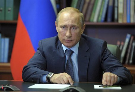 Russian President Vladimir Putin attends a meeting with top officials in Blagoveshchensk May 22, 2014. REUTERS/Alexei Druzhinin/RIA Novosti/ Russian President Vladimir Putin attends a meeting with top officials in Blagoveshchensk May 22, 2014. REUTERS/Alexei Druzhinin/RIA Novosti/